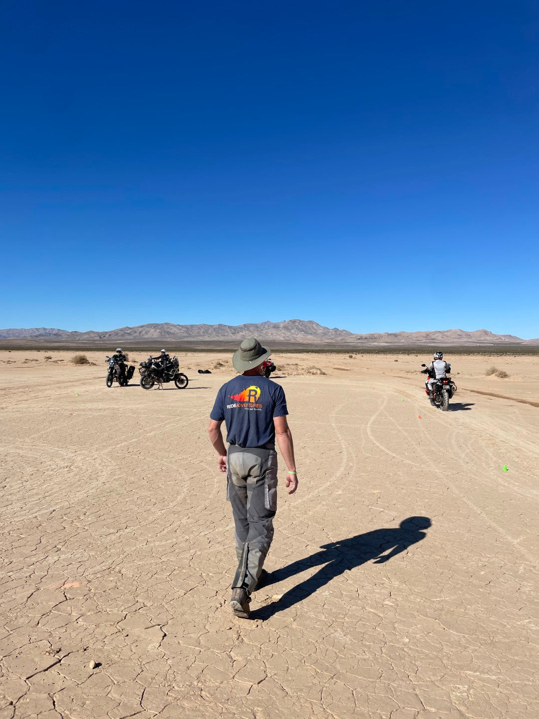 off road motorcycle trainer with training customers in Las Vegas desert