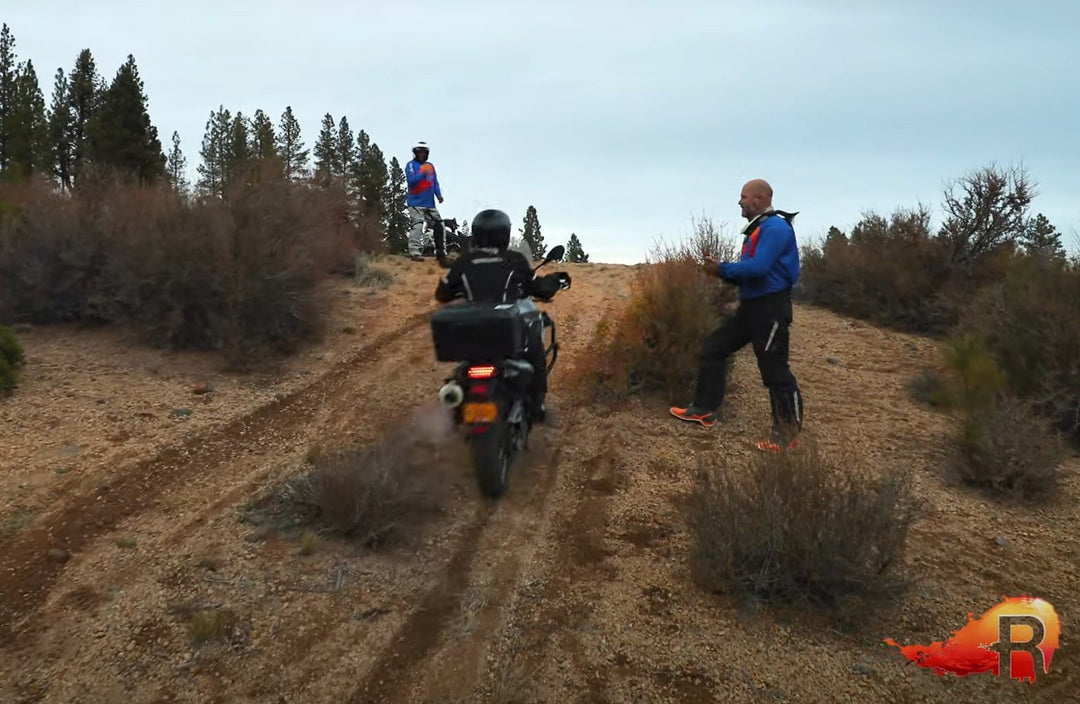 REAL life moto adv off-road training up a hill.